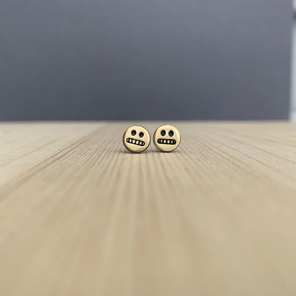 cringe face studs in brass